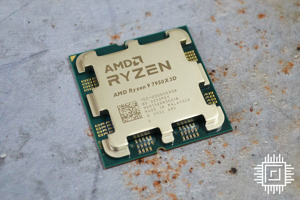 AMD Ryzen 9 7950X lies on a marble table.