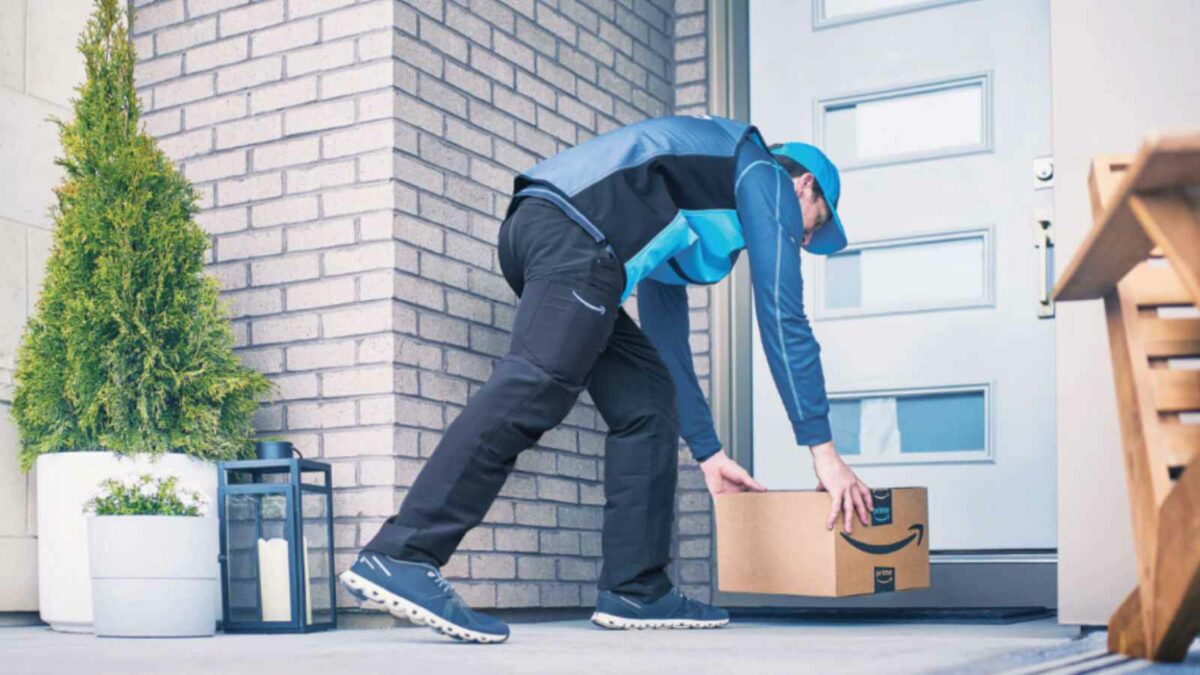 Amazon delivery driver places a parcel.