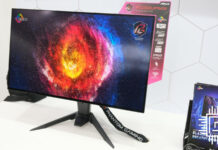 ASRock PGO32UFS28 gaming monitor, displaying a bright dust plume of varying colours