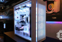 Side view of Corsair 9000D RGB Airflow super tower PC case, with its tempered glass side panel (left) and semi-transparent front panel (right)