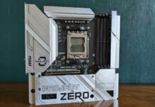 MSI B650M Project Zero motherboard, standing upright on a wooden surface, against a green background