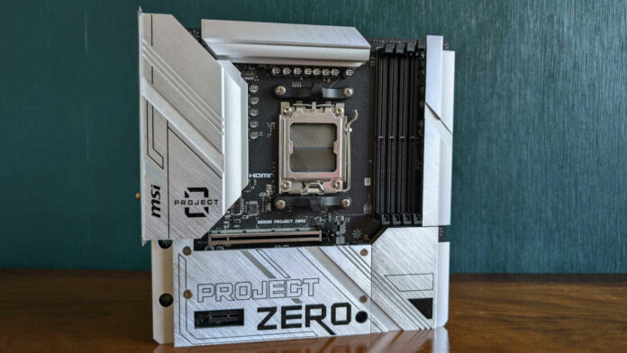 MSI B650M Project Zero motherboard, standing upright on a wooden surface, against a green background