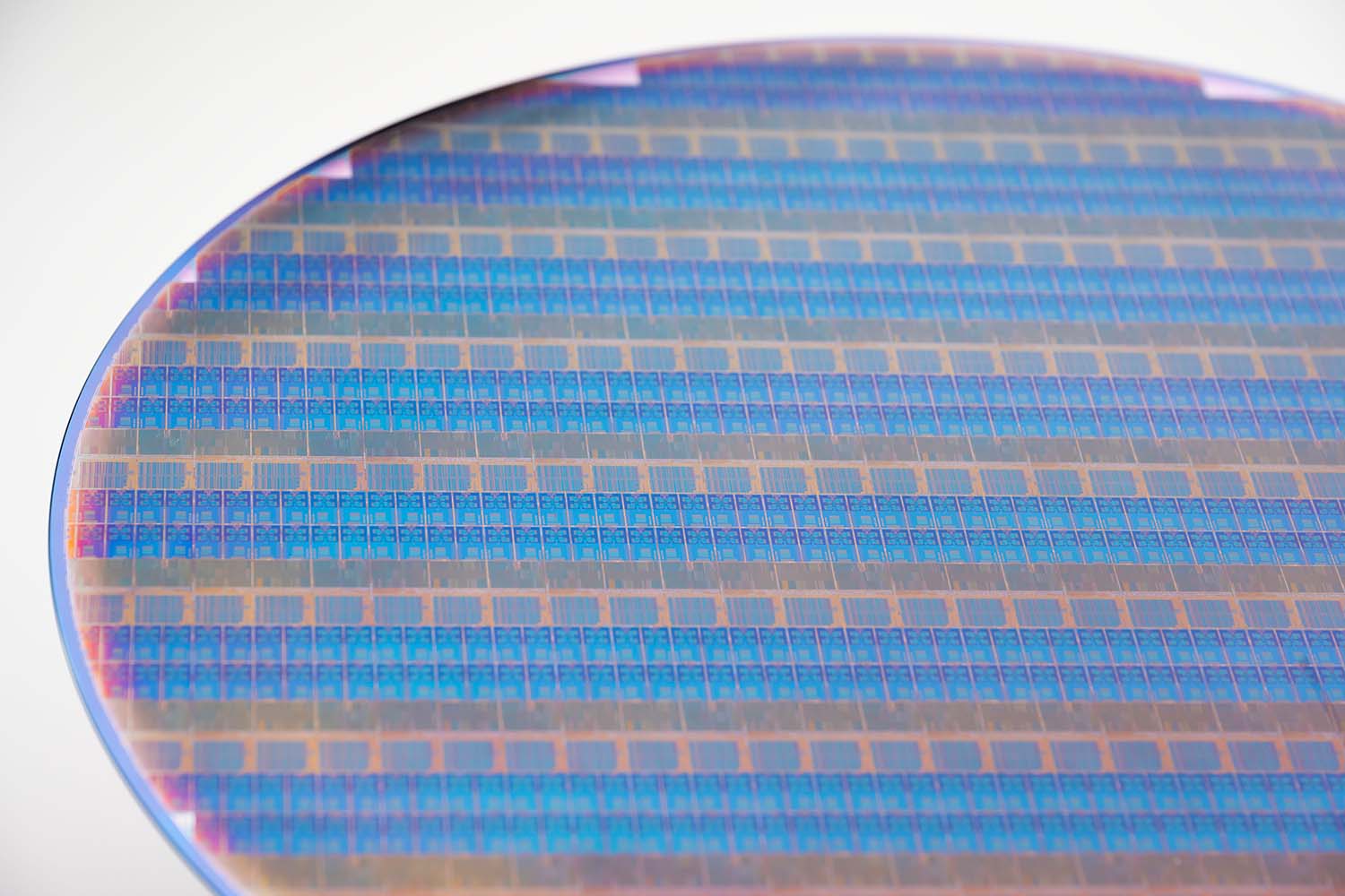 A test wafer chip showing PowerVia technology that helps reduce manufacturing costs.