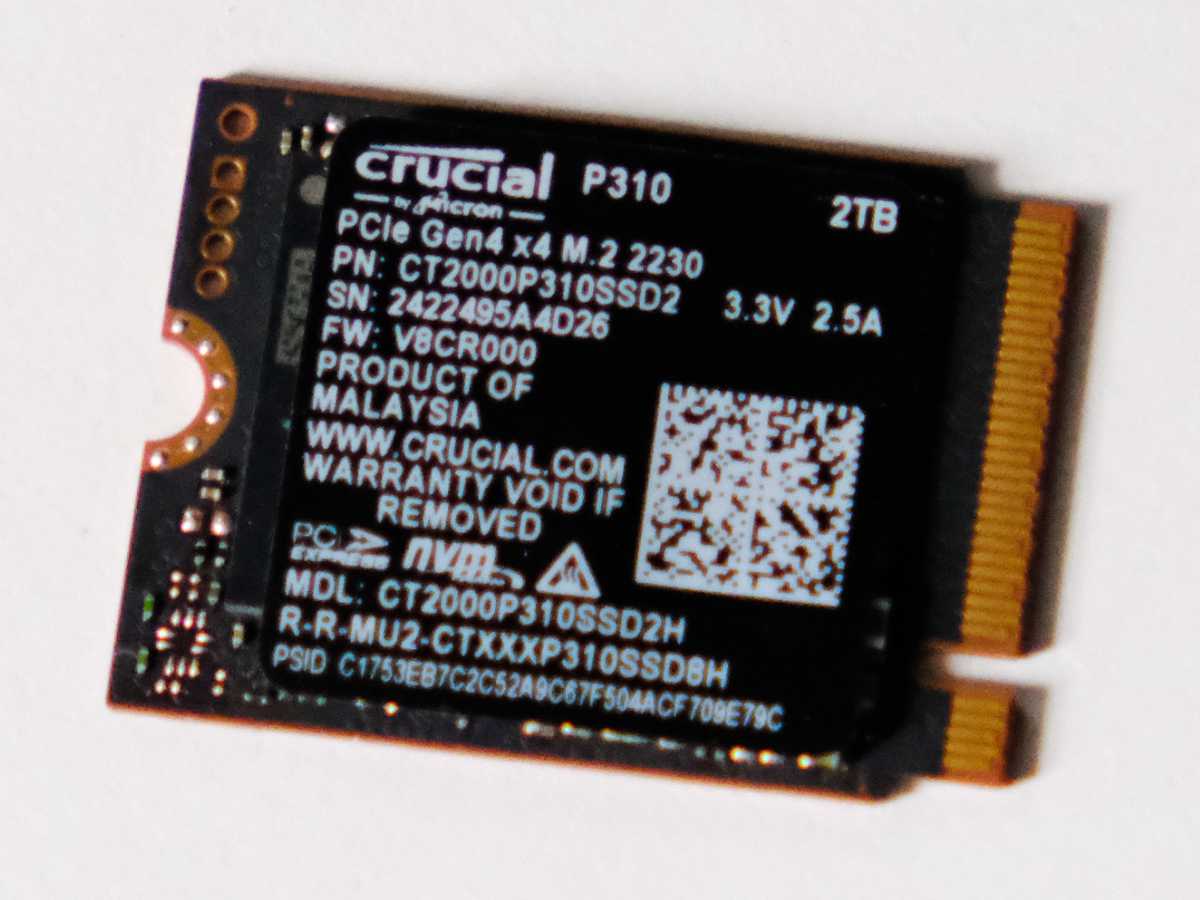 Crucial P310 mini SSD against a white background.