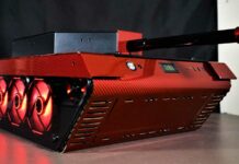 Mai PC's custom computer stuffed inside a red carbon fibre military tank.