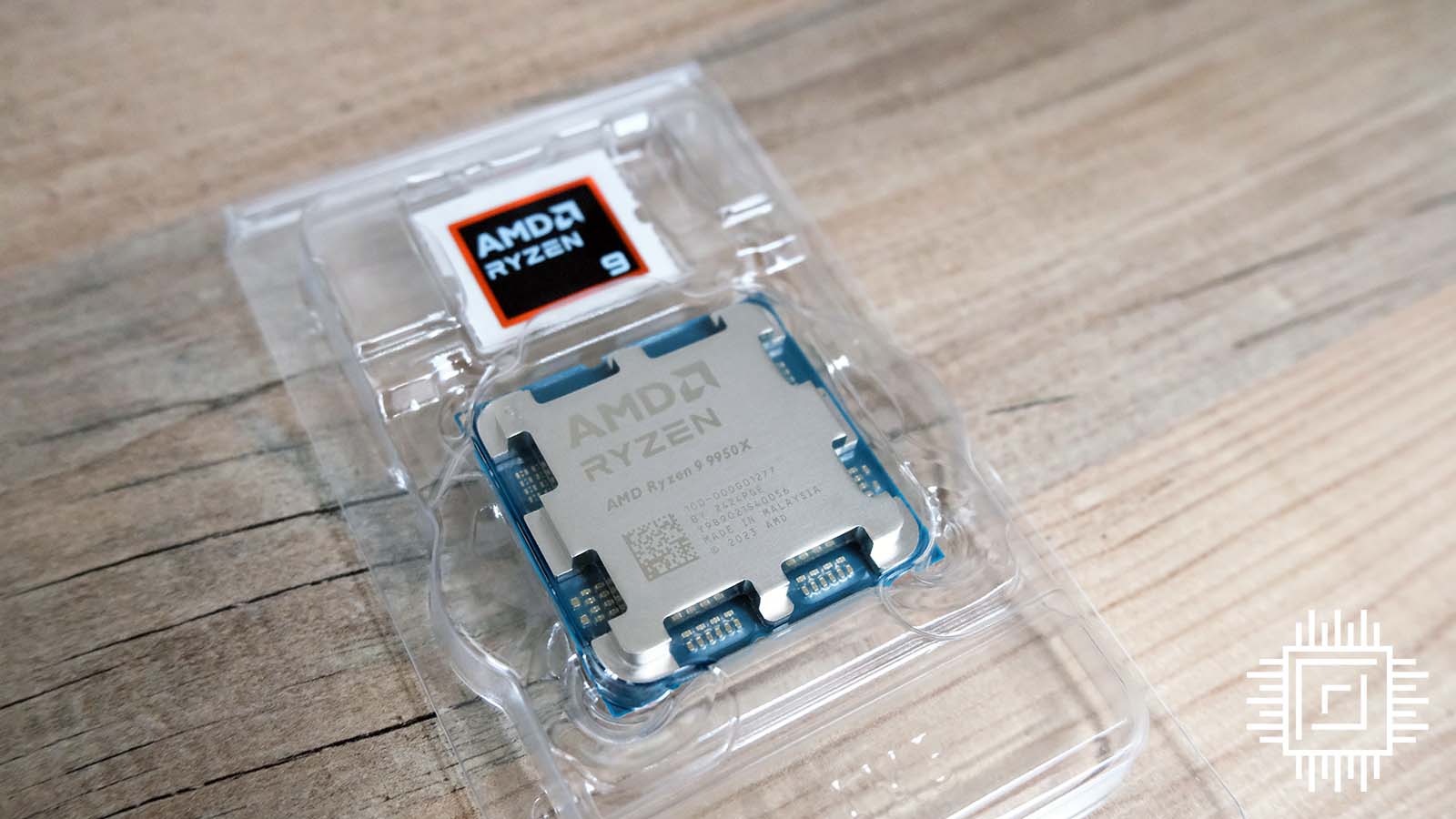 A picture of the AMD Ryzen 9 9950X CPU in its clamshell packaging.