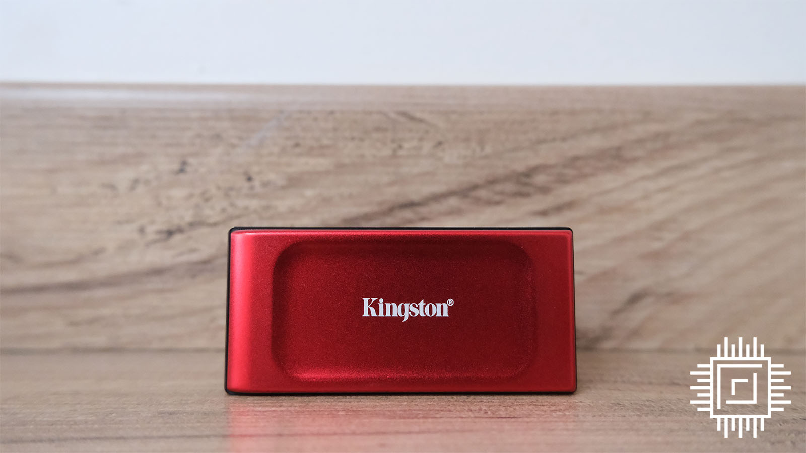 A picture showing the Kingston XS1000 Red 2TB on a background.