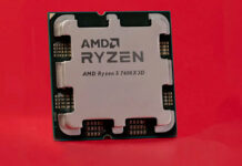 AMD Ryzen 5 7600X3D processor against a red backdrop