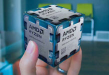 A cube of Ryzen 9000X3D processors, held in a hand