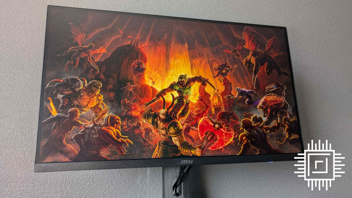 MSI MAG 274QRF QD E2 displaying key art from Doom Eternal