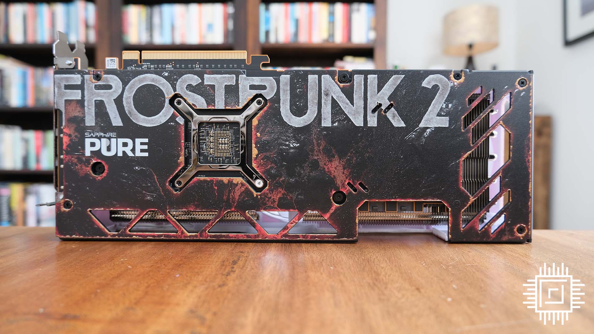 A picture of the Sapphire Radeon RX 7700 XT Frostpunk 2 card from the back.