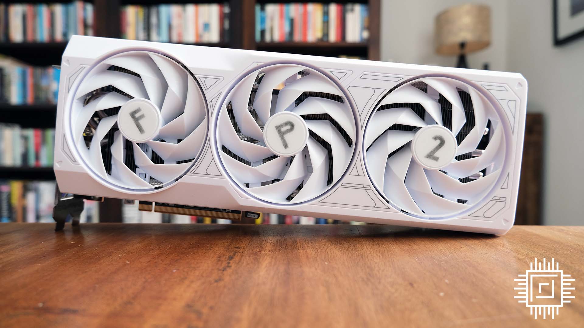 A picture of the Sapphire Radeon RX 7700 XT Frostpunk 2 card from the front.