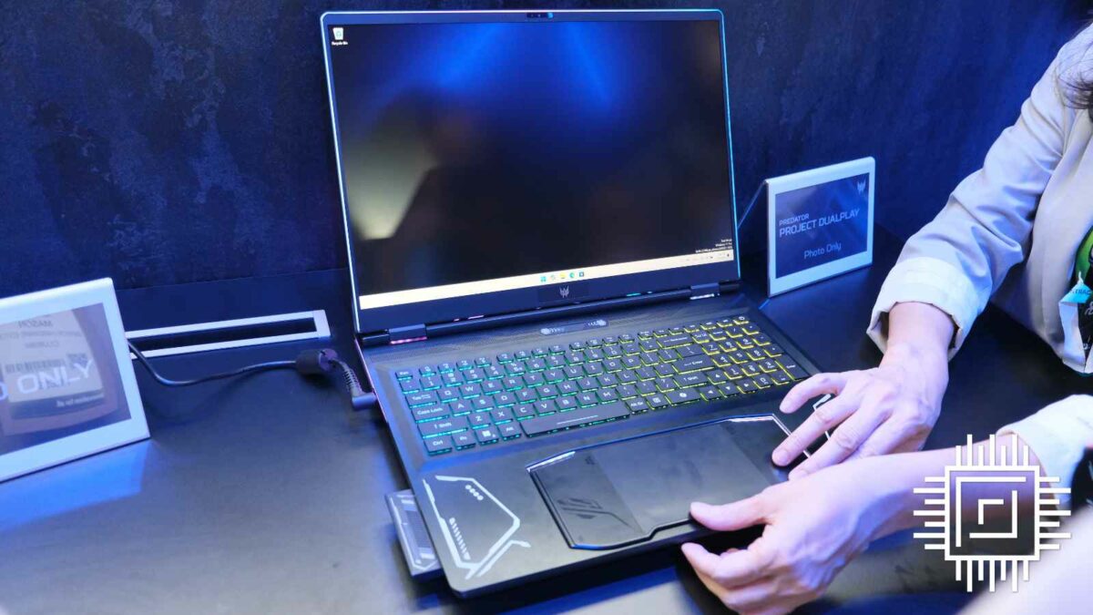 Presenter removes trackpad on Acer Project Dual Play laptop