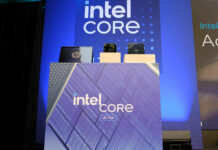 A podium with Intel Core Ultra 2 series branding, with three devices sat atop it