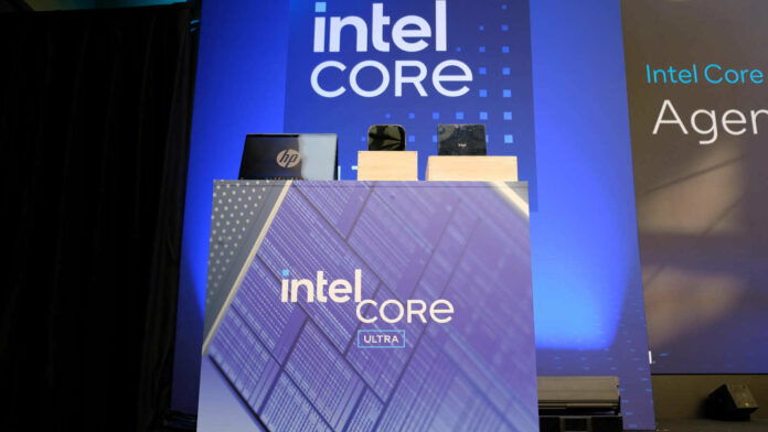 A podium with Intel Core Ultra 2 series branding, with three devices sat atop it