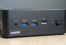 Front view of MSI Cubi NUC 1M, showcasing an array of ports and its power button.