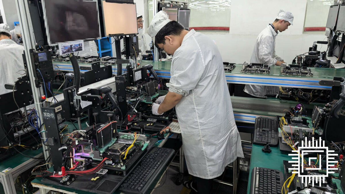 An operator in MSI motherboard factory, conducting functionality tests on motherboards.