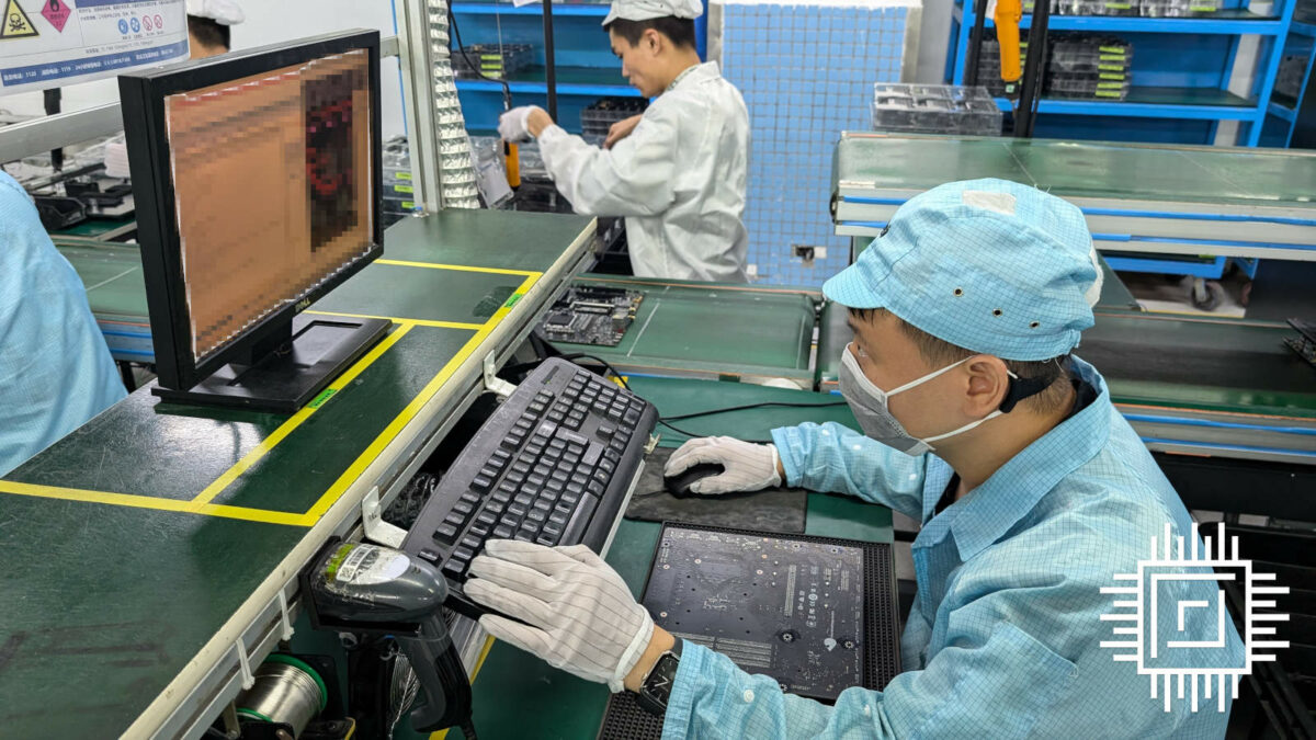 An operator in MSI factory, conducting spot checks on a motherboard.