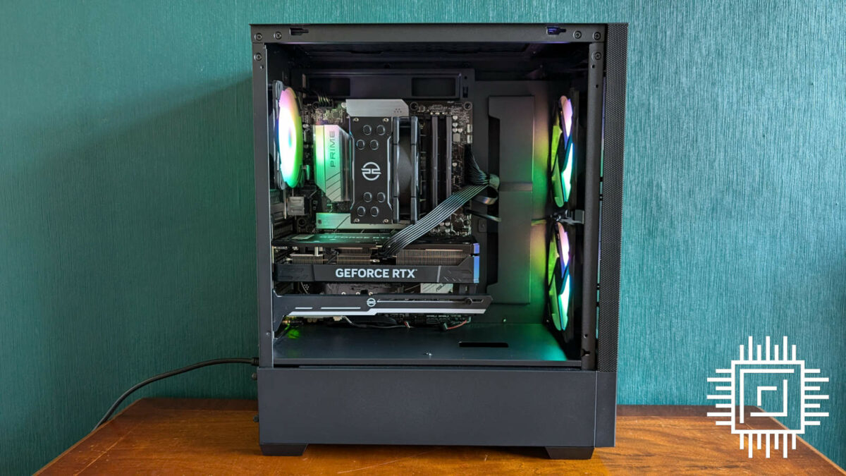 Side view of an open PCSpecialist Helio Elite PC, its fan spinning in a rainbow pattern.