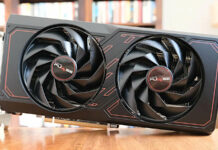 Radeon RX 7600 graphics card, atop a wooden surface