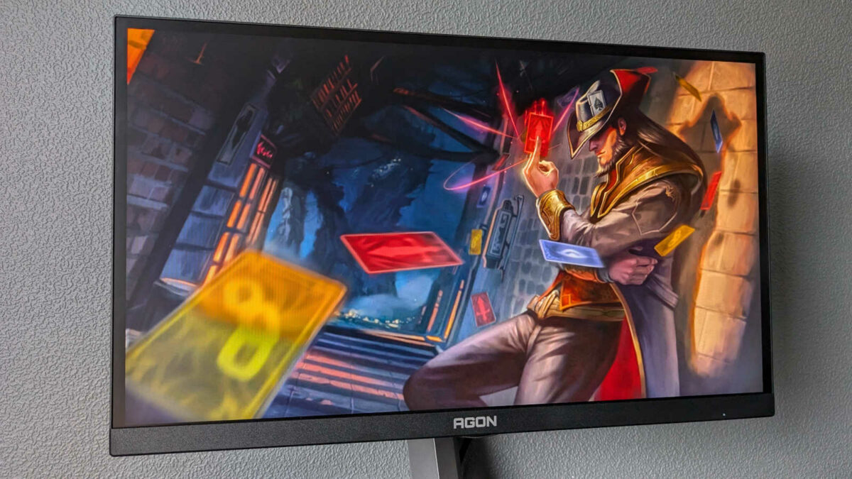 AOC Agon Pro AG246FK displaying a wallpaper from League of Legends.