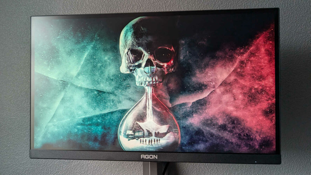 AOC Agon Pro AG246FK displaying a wallpaper from Until Dawn.