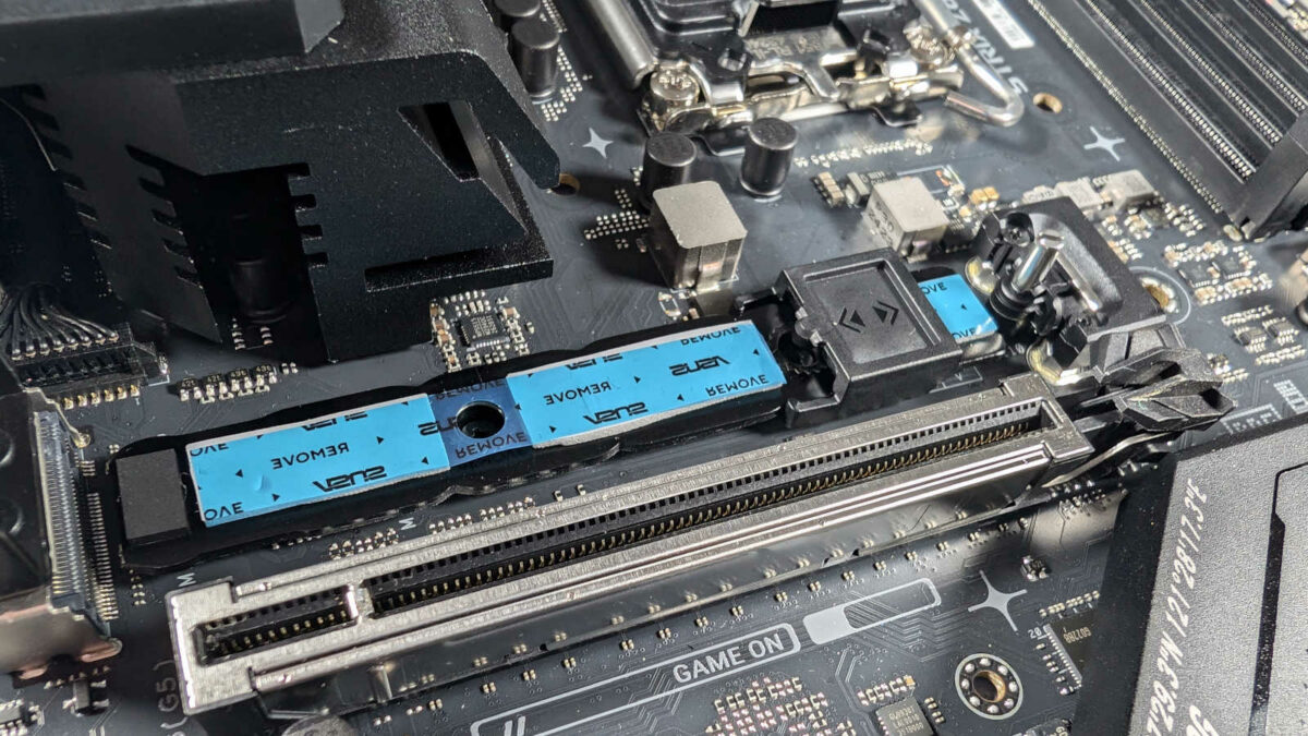 Close up of ROG Strix Z890-F Gaming WiFi M.2 slot, featuring 'Q-Slide' locking mechanism.