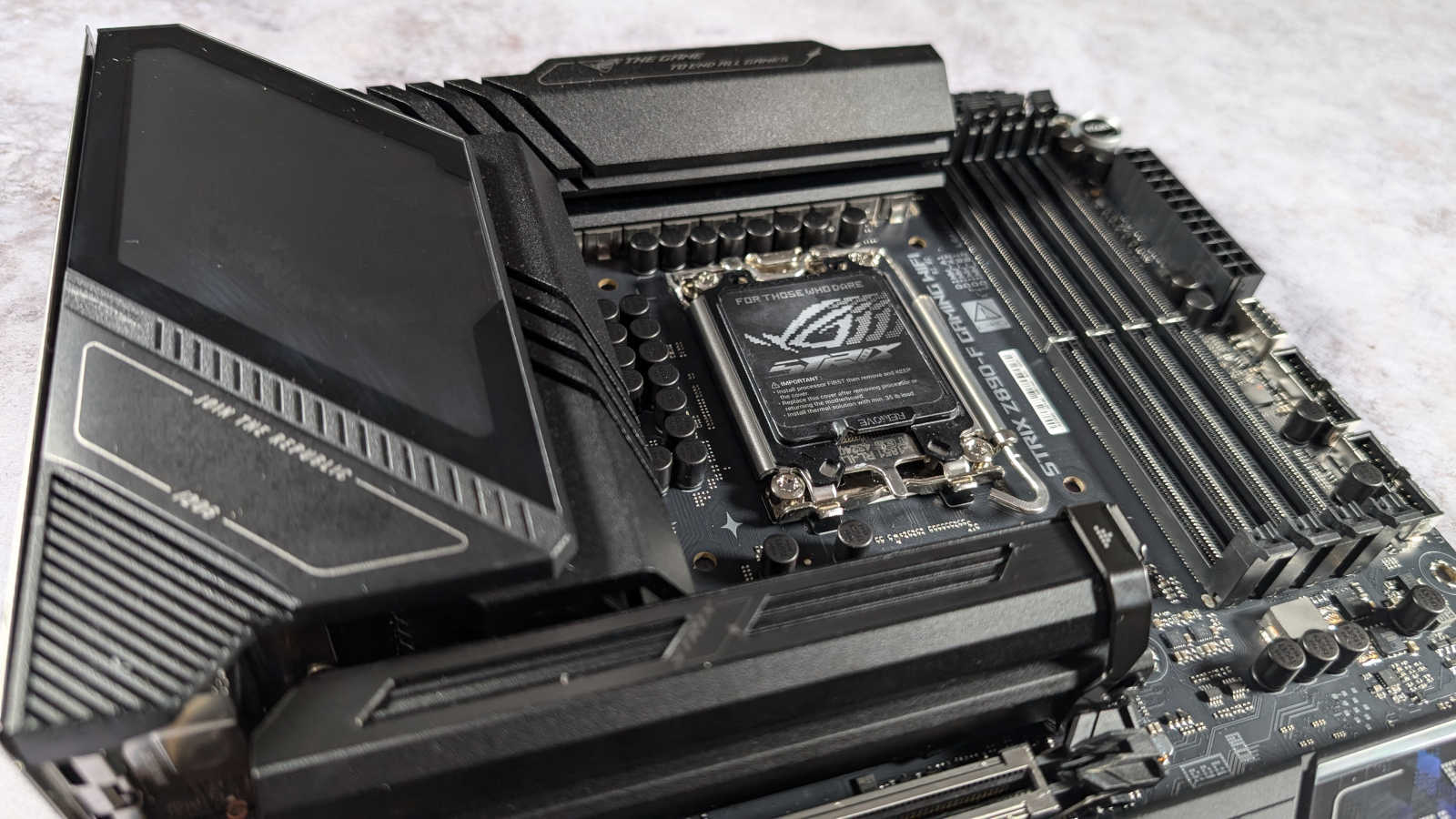 Top half of ROG Strix Z890-F Gaming WiFi motherboard.