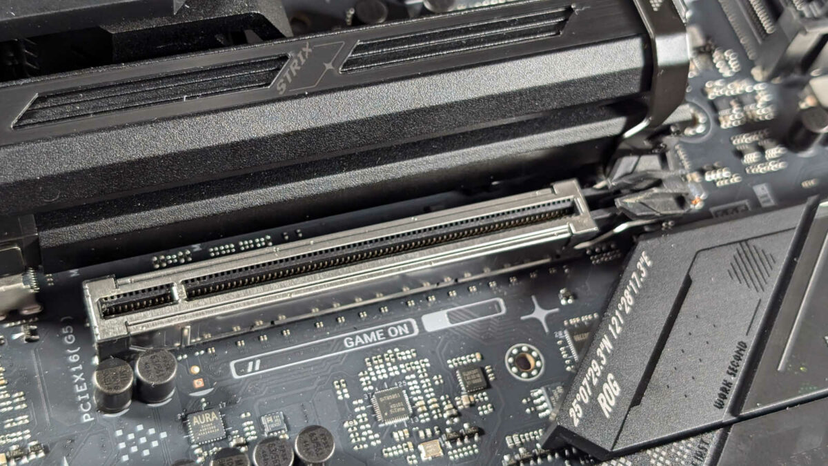 Close up of reinforced PCIe slot on ROG Strix Z890-F Gaming WiFi motherboard.