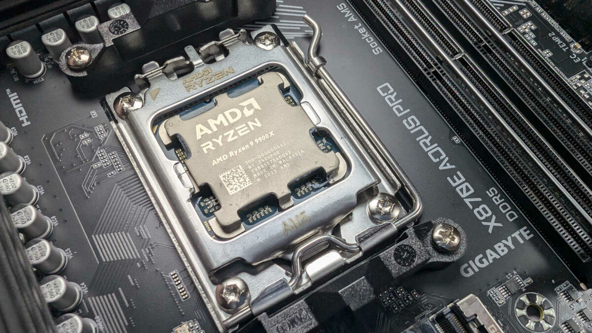 AMD Ryzen 9 9900X processor inside CPU socket of X870E Aorus Pro.