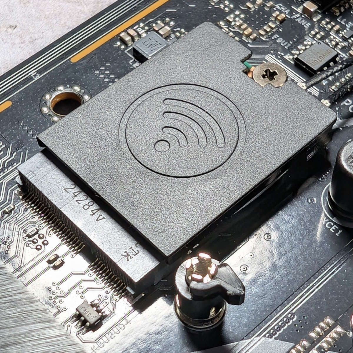 Close up of WiFi module on ASRock PG Z890 Lightning WiFi.