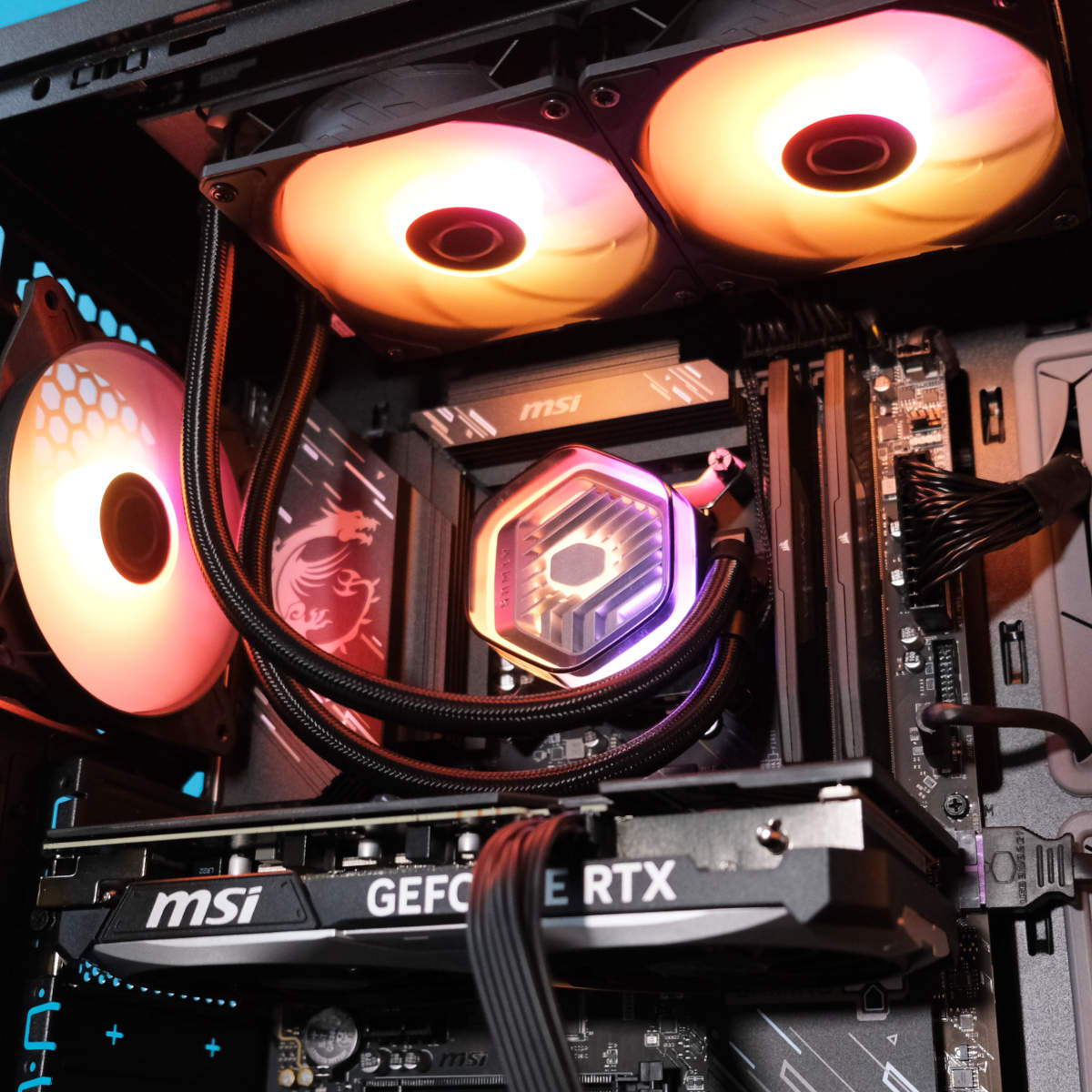 CyberpowerPC UK Infinity Z890 Pro AIO orange RGB lighting.