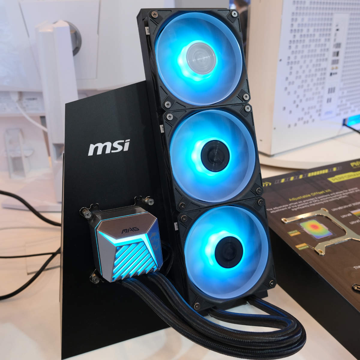 MSI CoreLiquid A15 360 AIO cooler mounted to a stand.