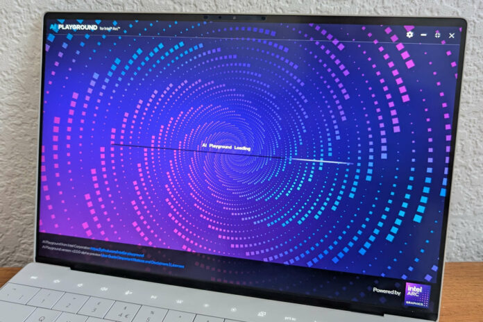 An AI PC's display, showing Intel AI Playground loading.