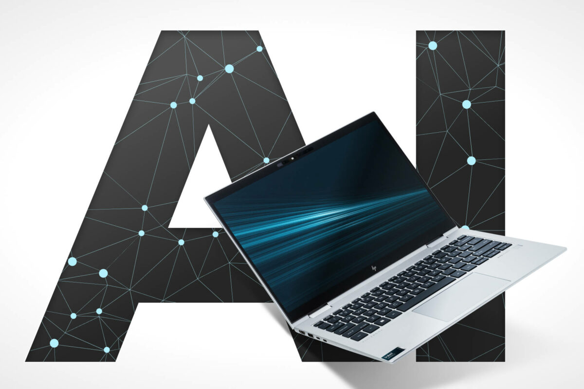 The acronym 'AI' stands behind an HP laptop.