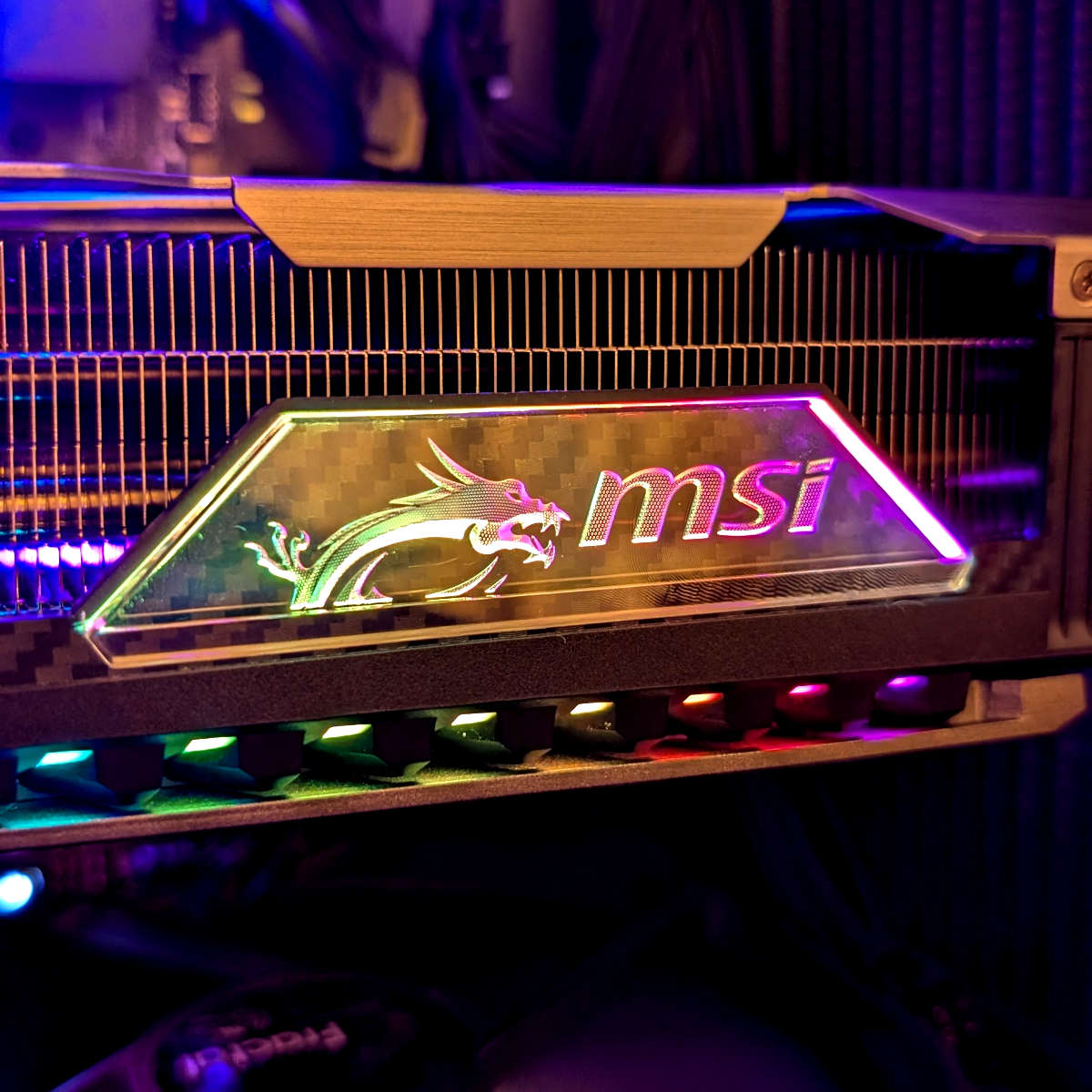 Close up of RGB logo on MSI GeForce RTX 5080 Vanguard.