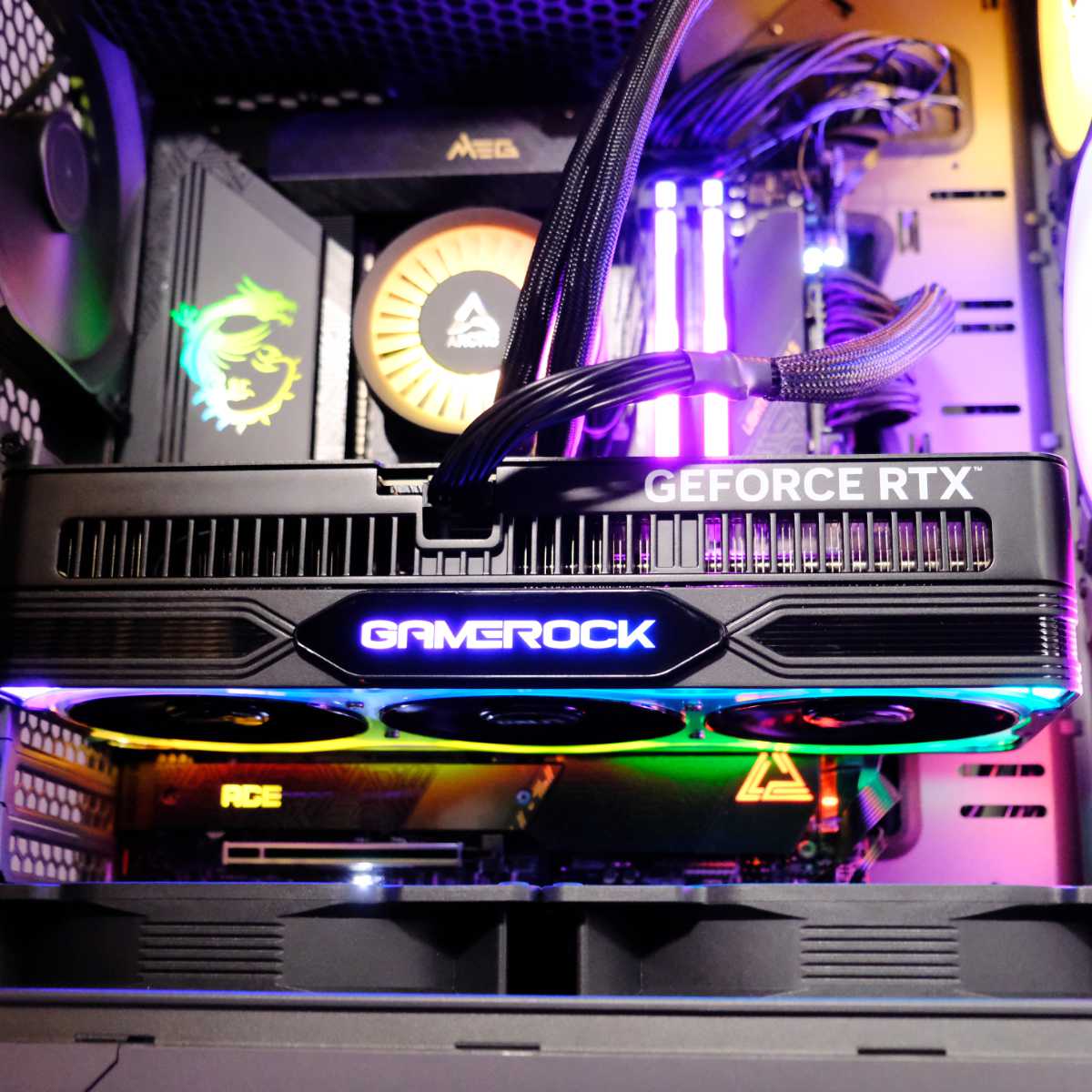 Palit GeForce RTX 5070 Ti GameRock lit up like a Christmas tree in a gaming PC.