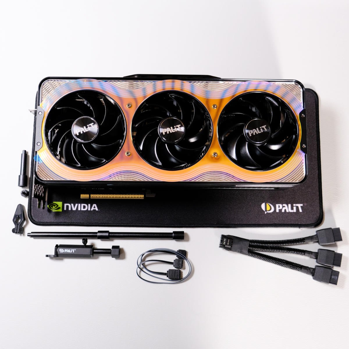 Palit GeForce RTX 5070 Ti GameRock with accessories, such as its three-way eight-pin splitter.