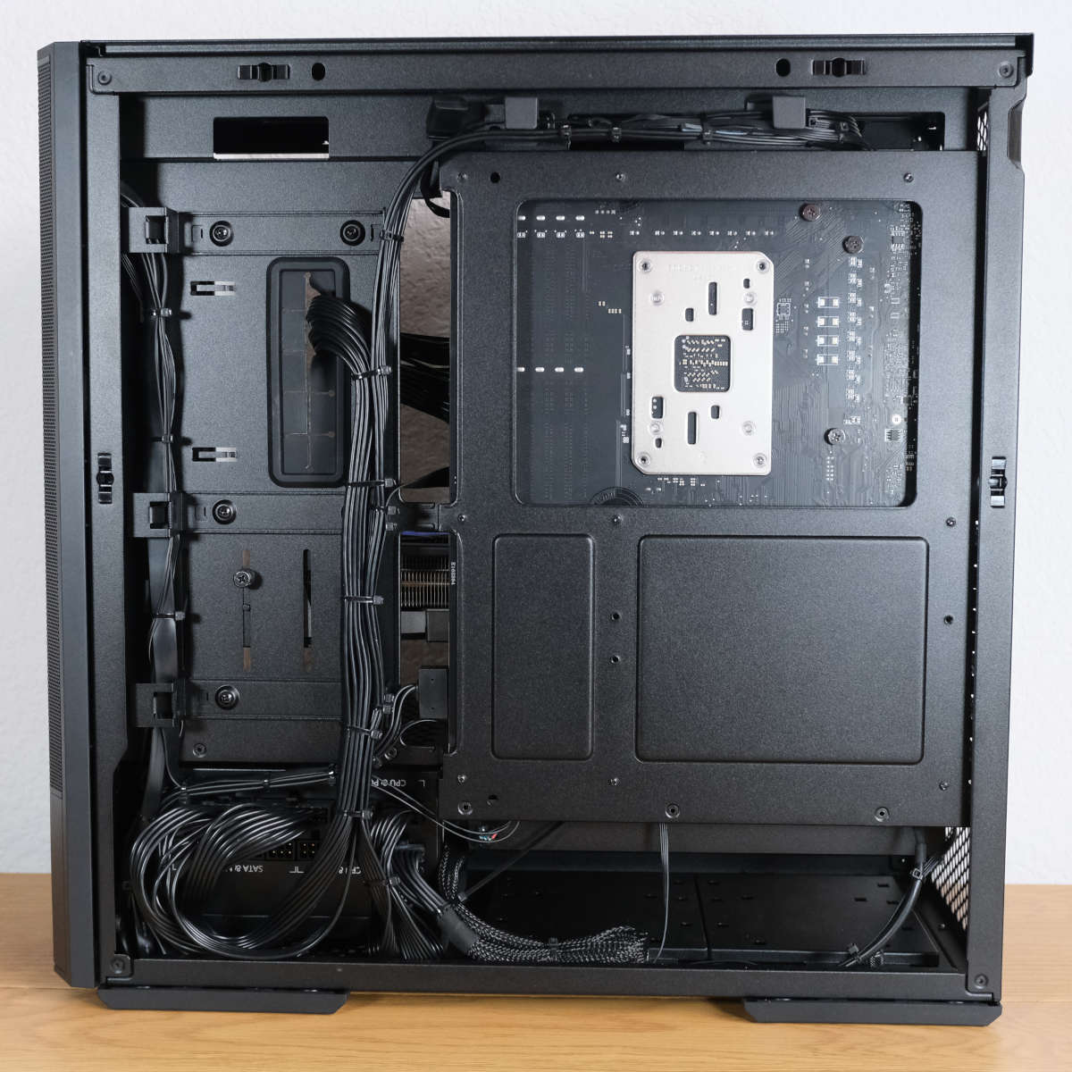 Wide shot of back panel of CyberpowerPC Ultra 5080, showing great cable management.