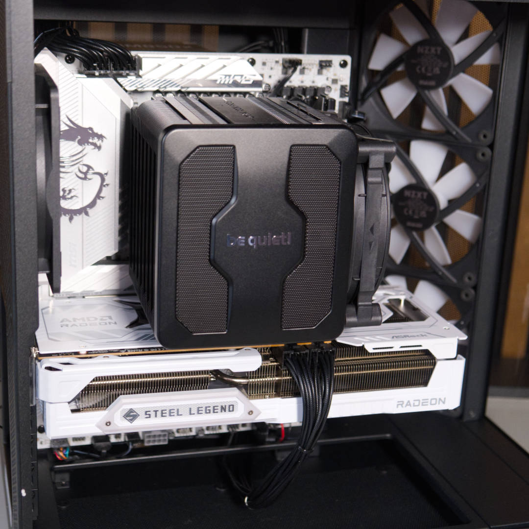 CyberpowerPC UK Ultra XT Custom PC panda design with white motherboard and black CPU cooler.