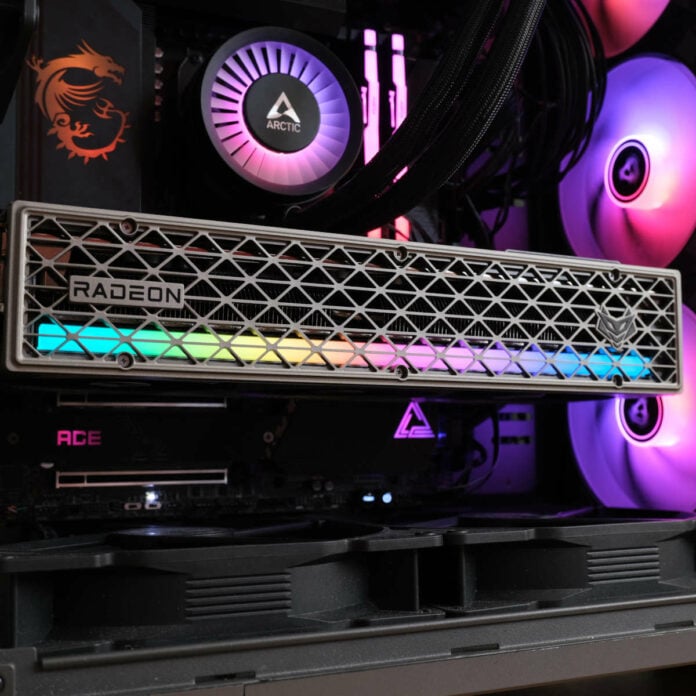 Sapphire Nitro+ Radeon RX 9070 XT nestled in a motherboard, surrounded by RGB fans and other components.